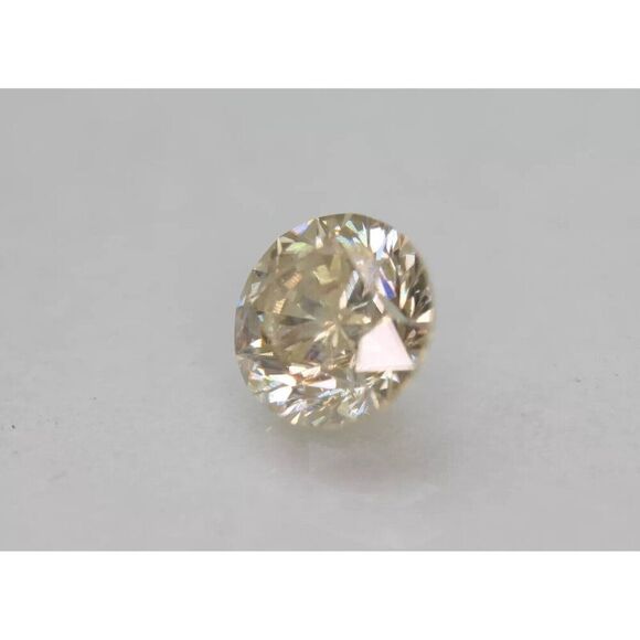 0.67 Carat Brown Yellow Round Brilliant Enhanced Natural Diamond 5.35mm - Picture 2 of 3